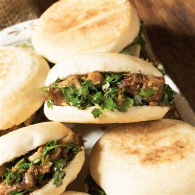  Rou Jia Mo: Un Sandwich Chinois Réconfortant Emballé dans une Pain Croustillant à l'Exterior et Fondant à l'intérieur !