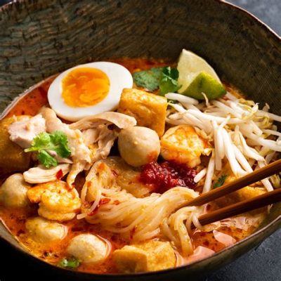  Curry Laksa: Un délicieux mélange crémeux et épicé de saveurs malaisiennes!