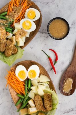  Gado-gado: Une symphonie de saveurs végétales épicées et un festival de textures croquantes!